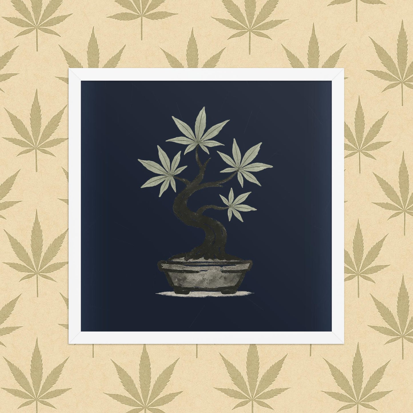 Framed 16x16 matte poster of an ink-style cannabis bonsai on a deep navy background, displayed in a simple white frame against a neutral leaf-pattern backdrop.