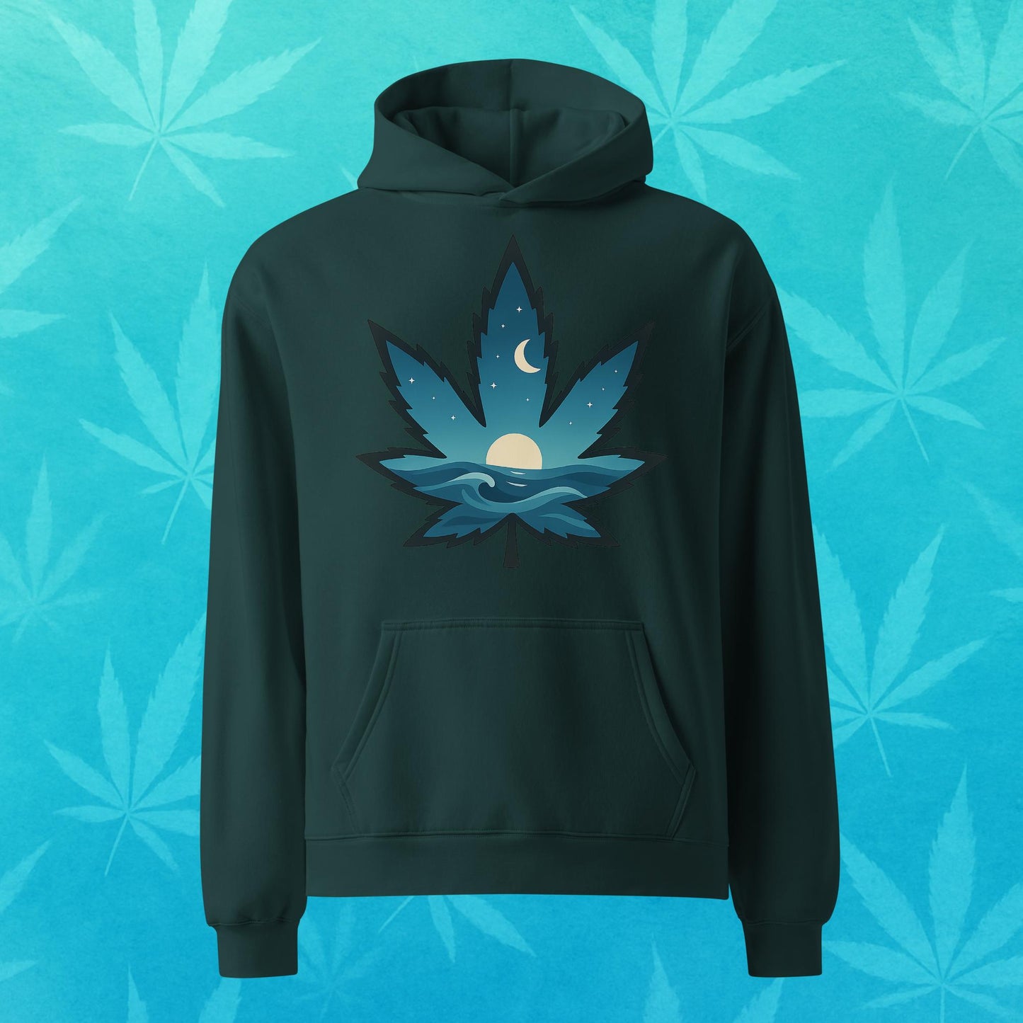 Oversized cobalt-green hoodie featuring a stylized cannabis leaf filled with ocean waves, rising sun, and crescent moon—cozy surf-inspired 420 streetwear, front view.