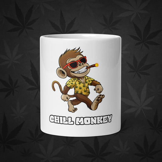 Chill Monkey glossy mug with Chill Monkey mascot smoking cannabis joint, 11-oz white ceramic coffee cup, front view.