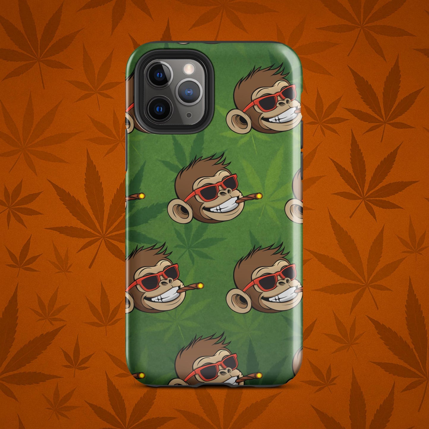Chill Monkey tough phone case with Chill Monkey mascot smoking cannabis joint, full-wrap 420 design for iPhone 11 Pro, glossy green front view.