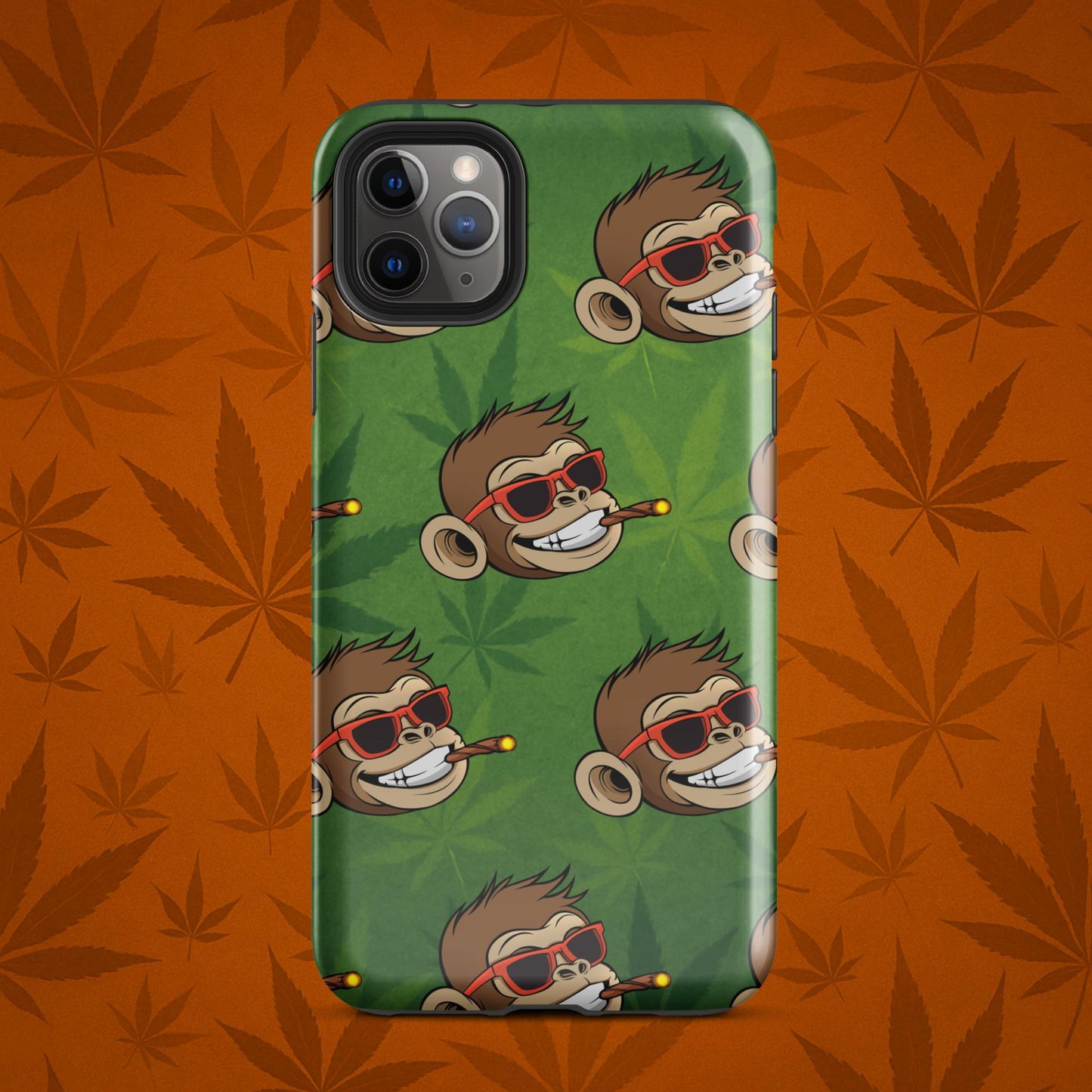 Chill Monkey tough phone case with Chill Monkey mascot smoking cannabis joint, full-wrap 420 design for iPhone 11 Pro Max, glossy green front view.