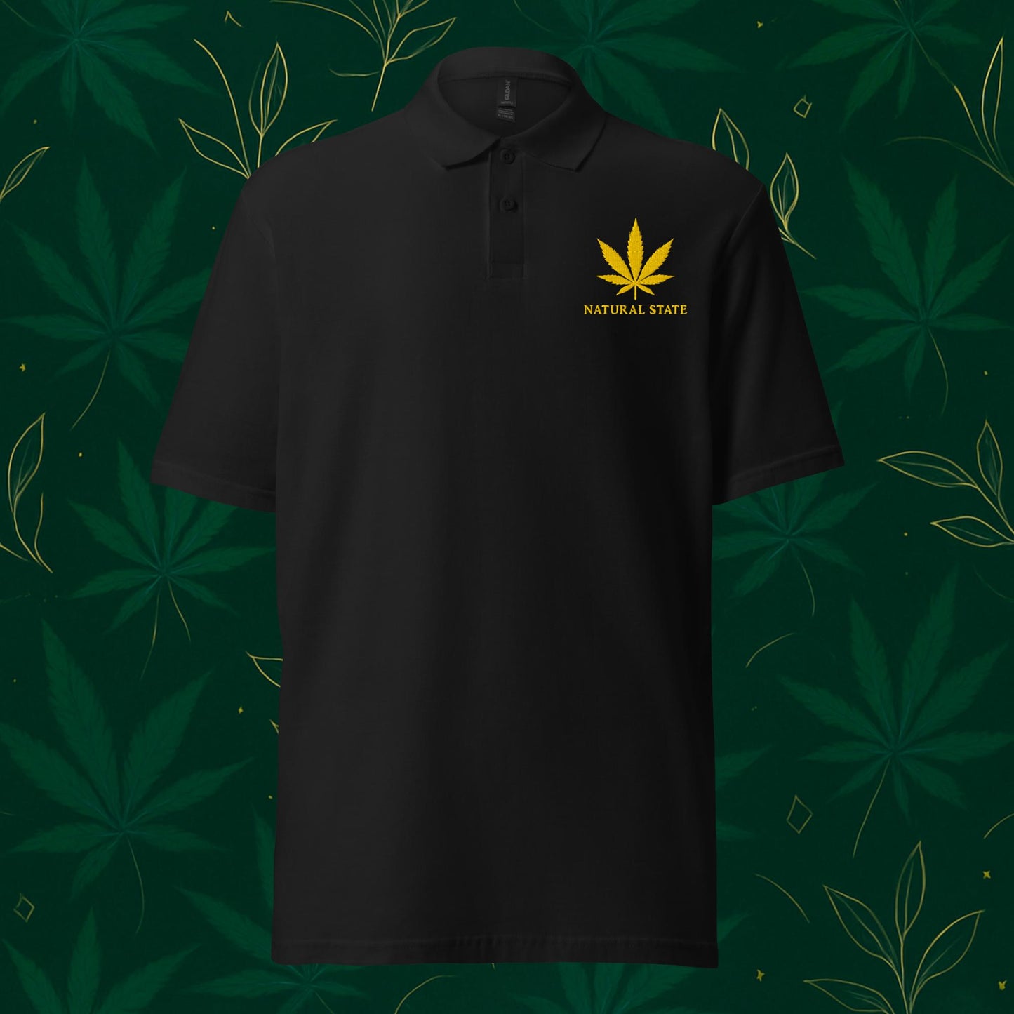 Chill Monkey piqué polo shirt “Gold Leaf” cannabis 420 with gold leaf chest embroidery and “Natural State” text, front view, black color.