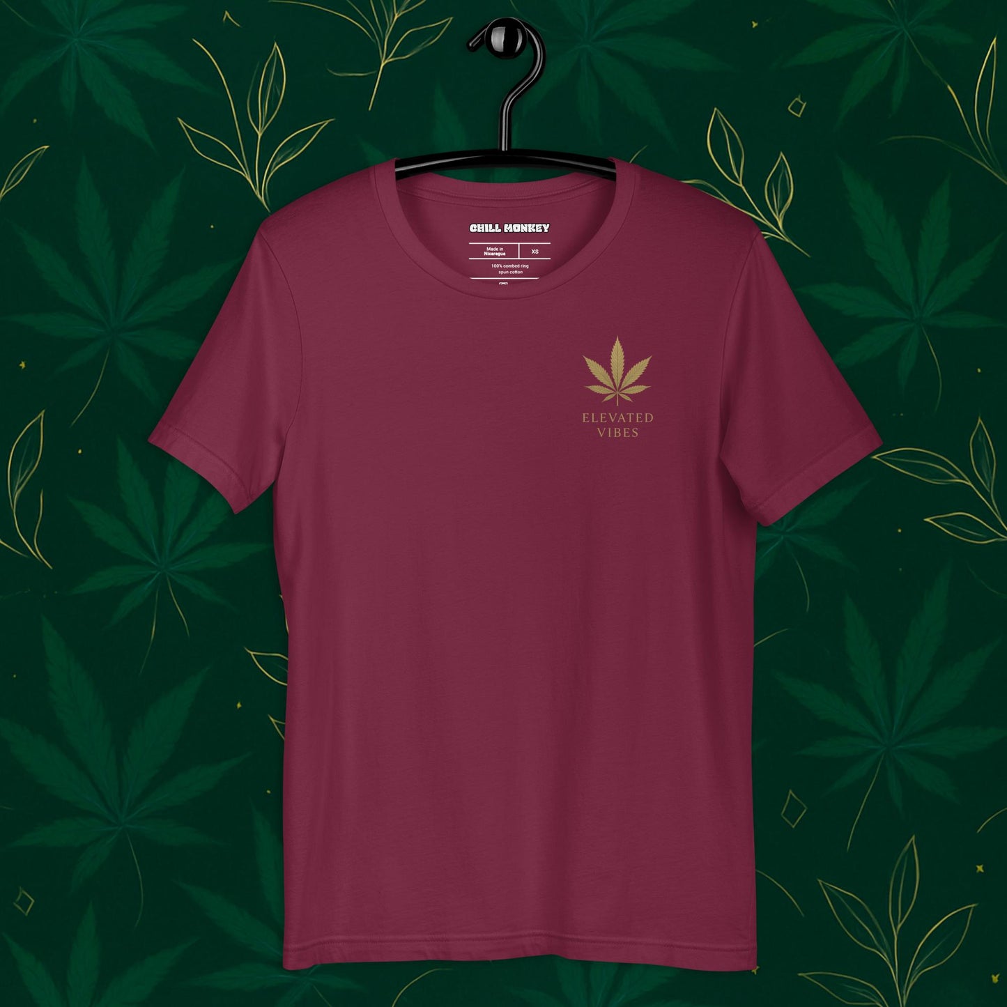 Chill Monkey unisex tee “Elevated Vibes” minimalist cannabis leaf chest logo, streetwear 420 style, front view, maroon color.
