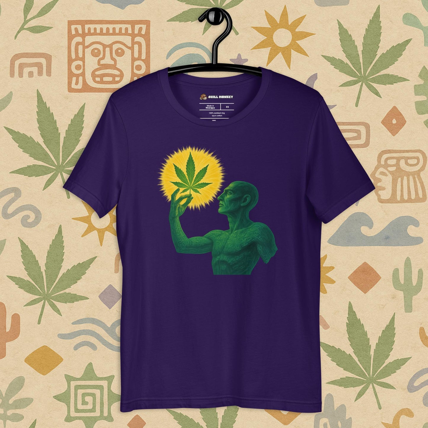 Chill Monkey unisex tee “Sacred Herb” featuring green mystical figure holding glowing cannabis leaf, streetwear 420 design, front view, purple color.