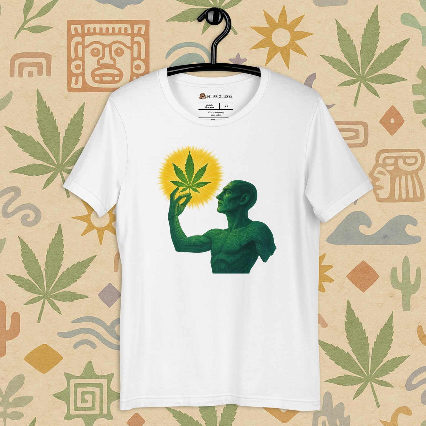 Chill Monkey unisex tee “Sacred Herb” featuring green mystical figure holding glowing cannabis leaf, streetwear 420 design, front view, white color.