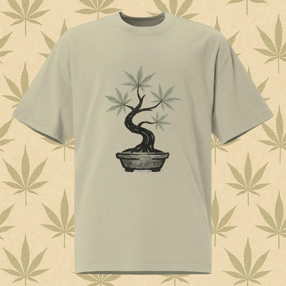 Oversized faded bone-eucalyptus weed 420 T-shirt with watercolor cannabis bonsai graphic on the front and bold “KEEP IT CHILL” text on the back, perfect stoner streetwear.